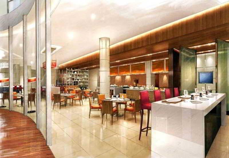 Courtyard By Marriott Kochi Airport Hotel Nedumbassery Restaurant billede The restaurant