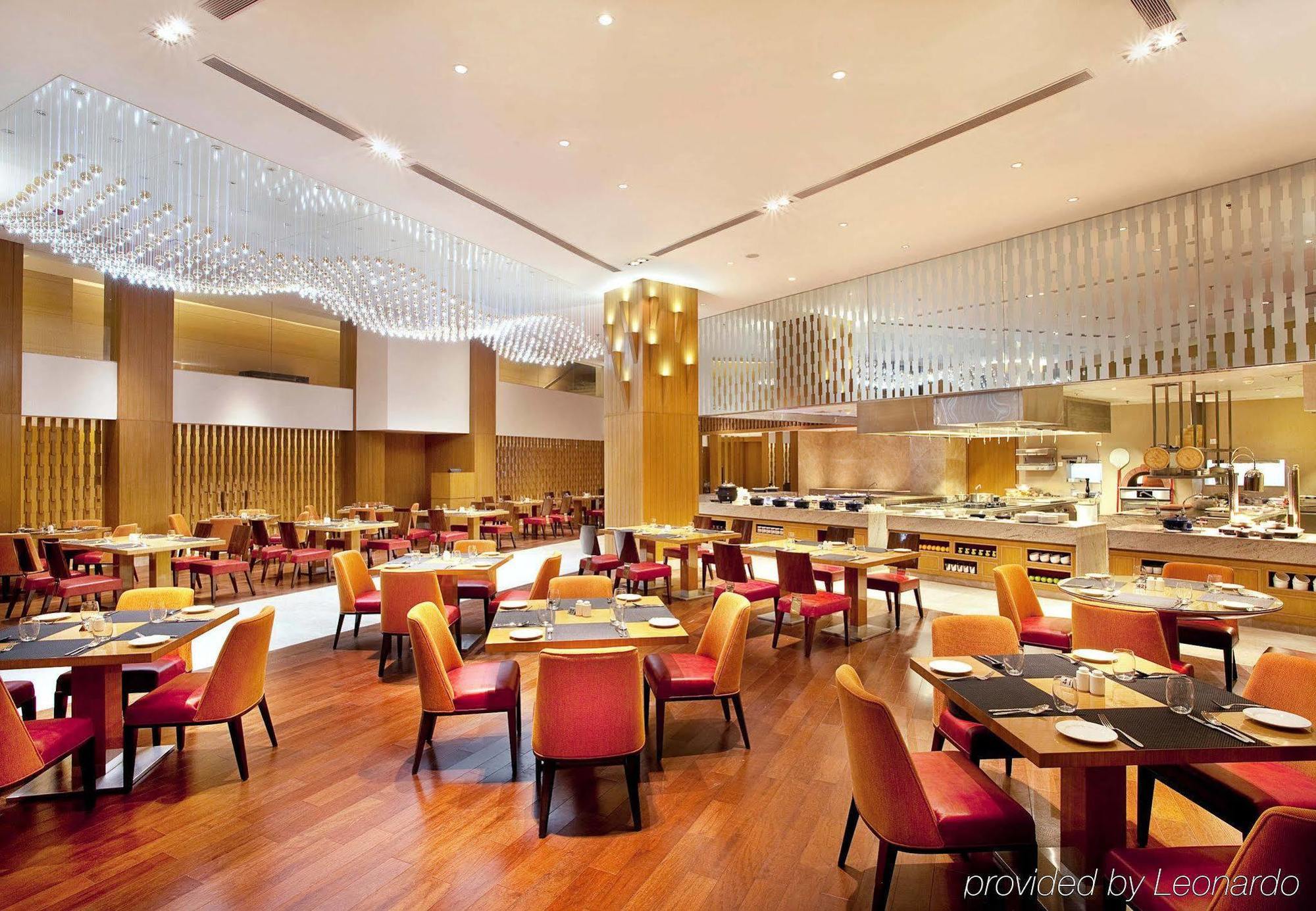 Courtyard By Marriott Kochi Airport Hotel Nedumbassery Eksteriør billede The restaurant